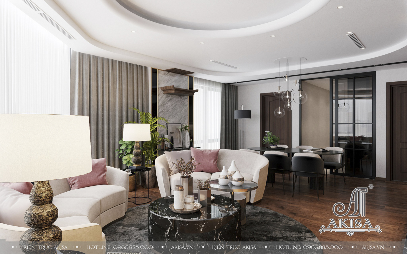 Không gian phòng khách sử dụng 2 gam màu trắng và ghi chủ đạo, kết hợp với các đồ nội thất cao cấp tạo nên vẻ nhẹ nhàng, sang trọng