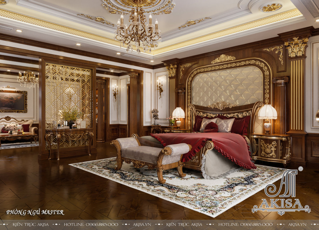 Chiếc giường king size màu nhung đỏ với những họa tiết dát vàng tinh xảo tạo điểm nhấn cho không gian phòng ngủ cổ điển