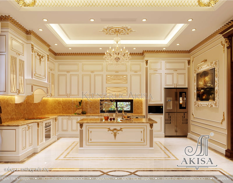 Không gian phòng bếp đầy ấn tượng với những chi tiết phào chỉ dát vàng làm điểm nhấn kết hợp với ánh sáng lấp lánh từ đèn chùm tinh xảo tạo nên một tổng thể hài hòa và ấn tượng cho căn bếp.