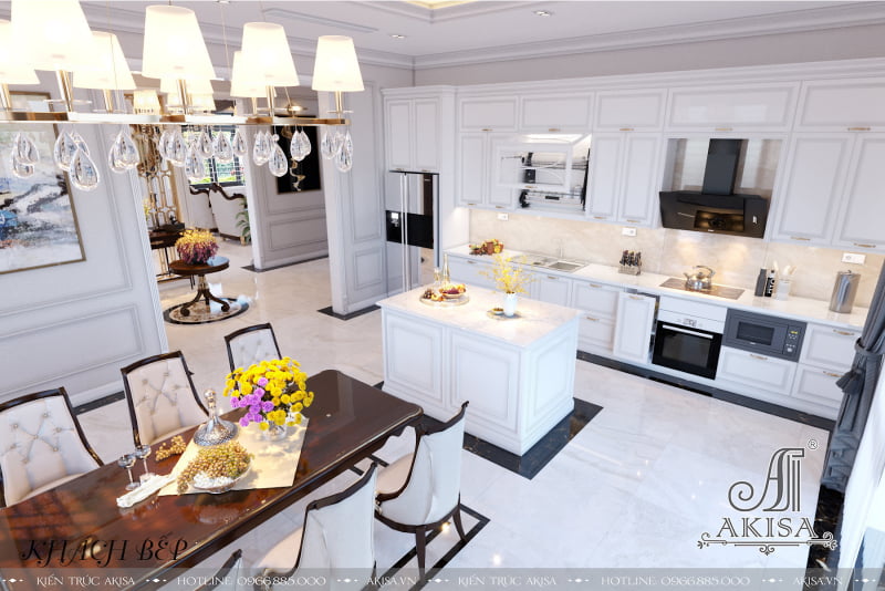 Nội thất phòng bếp sử dụng gam màu trắng làm chủ đạo từ hệ tủ bếp, bàn đảo và gạch lát sàn tạo nên không gian trang nhã và thu hút.