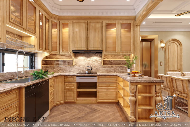 Thiết kế khu vực bếp nấu khoa học và tiện nghi với hệ thống tủ bếp gỗ tự nhiên công năng tiện ích phù hợp, kết hợp với bàn đảo với bề mặt là chất liệu đá marble sang bóng đầy tinh tế.