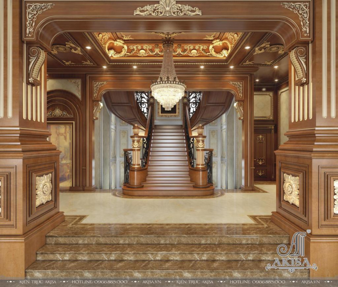 Cầu thang bề thế, hoành tráng bằng gỗ gõ đỏ với khung viền hoa văn trang trí tinh xảo