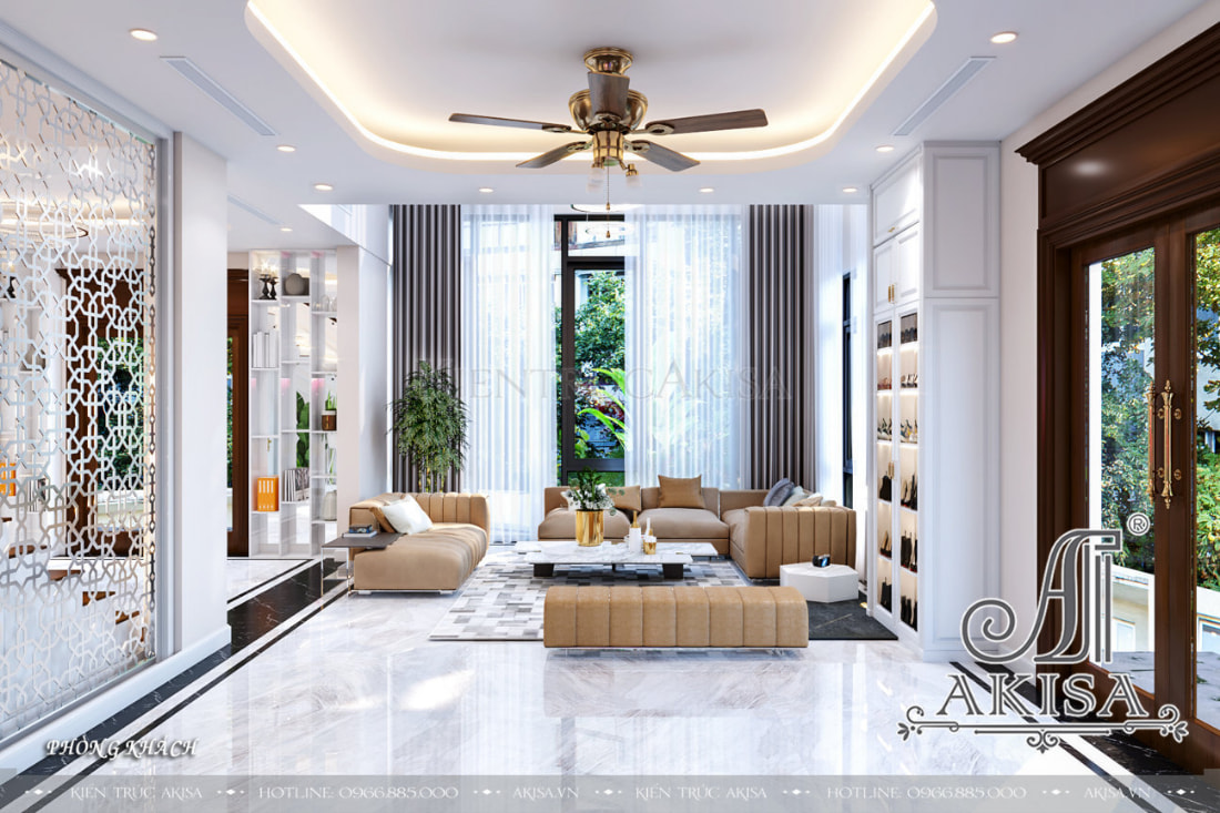 Gam màu trắng chủ đạo cùng thiết kế mở tạo nên không gian phòng khách rộng rãi, thông thoáng và luôn bừng sáng. 